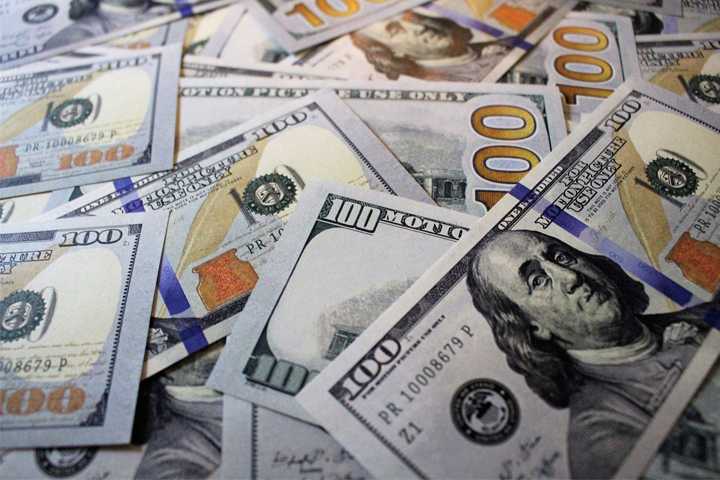 Dollar holds ground after US inflation data release